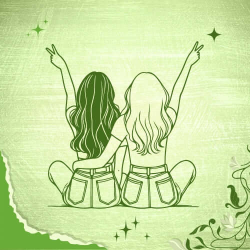 two women sitting together and raising their hands and making victory symblos with their fingers.